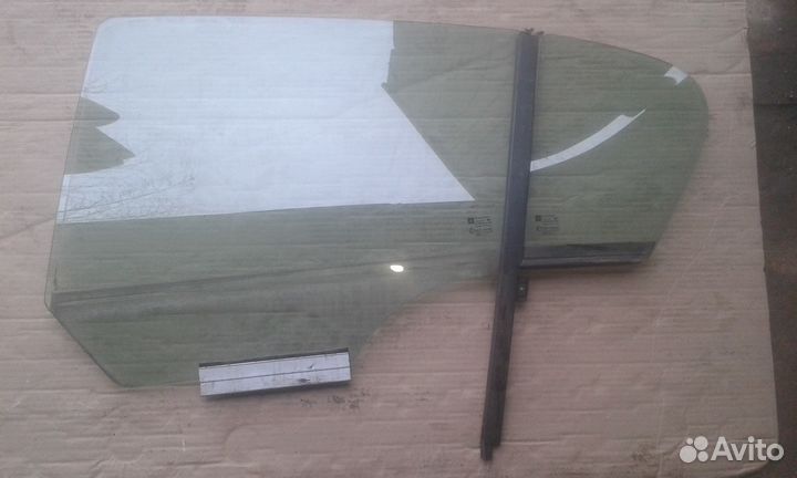 Стекло задней левой двери Opel Astra H 5D