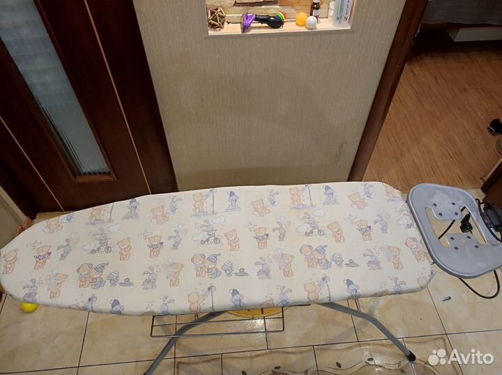 Гладильная доска с розеткой