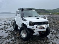 Suzuki Jimny 1.3 MT, 2012, 57 000 км, с пробегом, цена 2 600 000 руб.