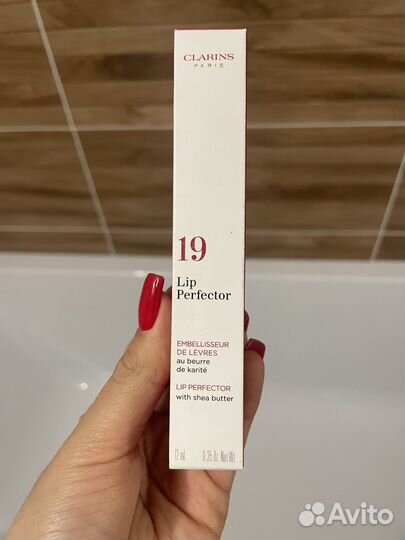 Блеск для губ clarins natural lip perfector