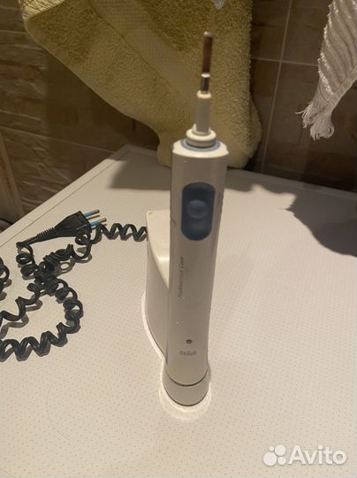 Электрическая зубная щетка