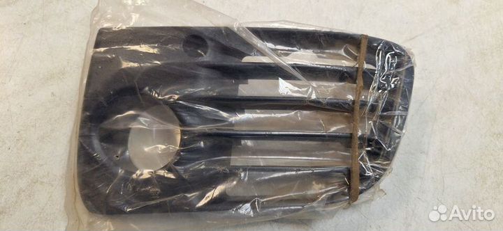 Решётка левой противотуманнойфарыMitsubishi Lancer