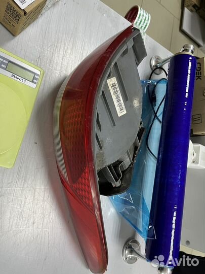 Фонарь левый Kia rio 3 оригинал