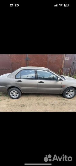 Двери митсубиси ланцер цедия