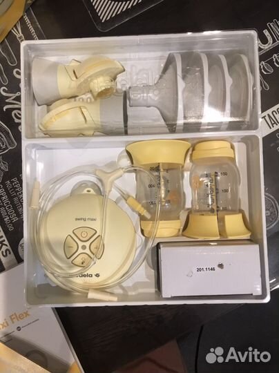 Молокоотсос medela swing flex электрический