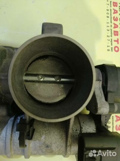 Электронная дросельная заслонка Лада