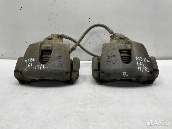 Суппорт передний левый / правый Mazda 3 BL 1.6