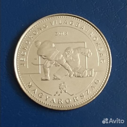 Монеты спорт