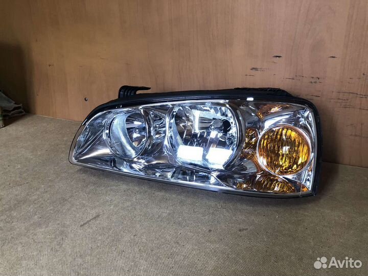 Фара левая Hyundai Elantra XD (03-10г) рест М/К
