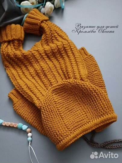 Вязаный комбинезон для новорожденного