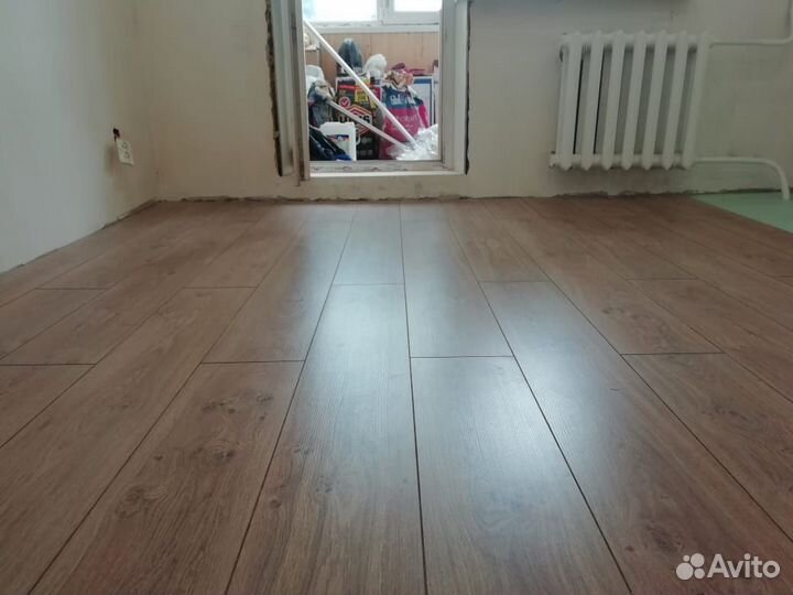 Укладка линолеума и ламината