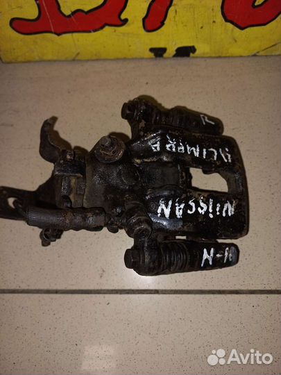 Суппорт задний правый Nissan Almera N16