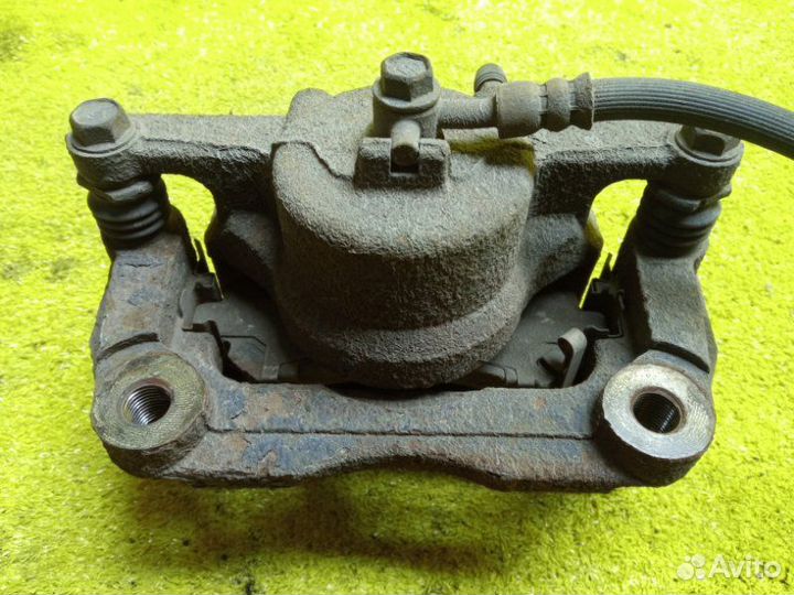 Суппорт передний правый Nissan Xtrail/Rogue/Dualis