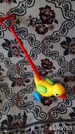 Игрушка каталка с ручкой