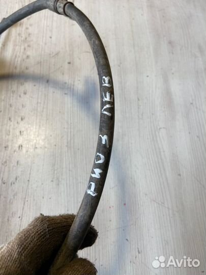 Трос стояночного тормоза левый Kia Rio 3