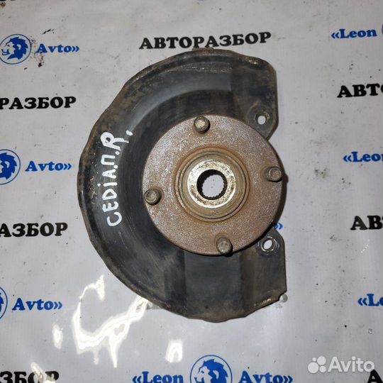 Поворотный кулак передний правый Mitsubishi Lancer