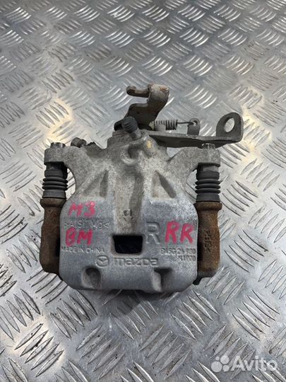 Суппорт задний правый Mazda 3 BM