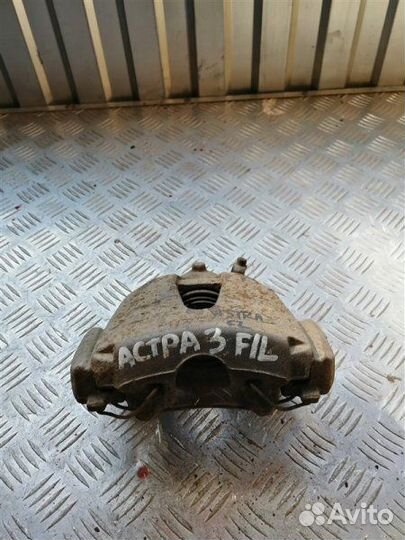 Суппорт тормозной передний левый Opel Astra H L69