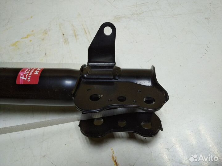 Амортизатор задний левый для Mazda 323F 1998-2003