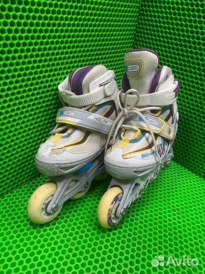 Роликовые коньки