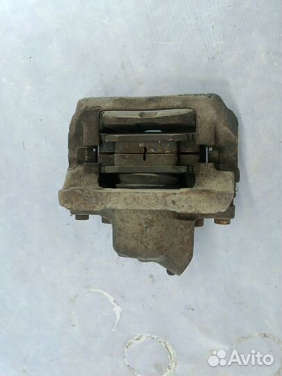 Суппорт левый Renault Logan 1