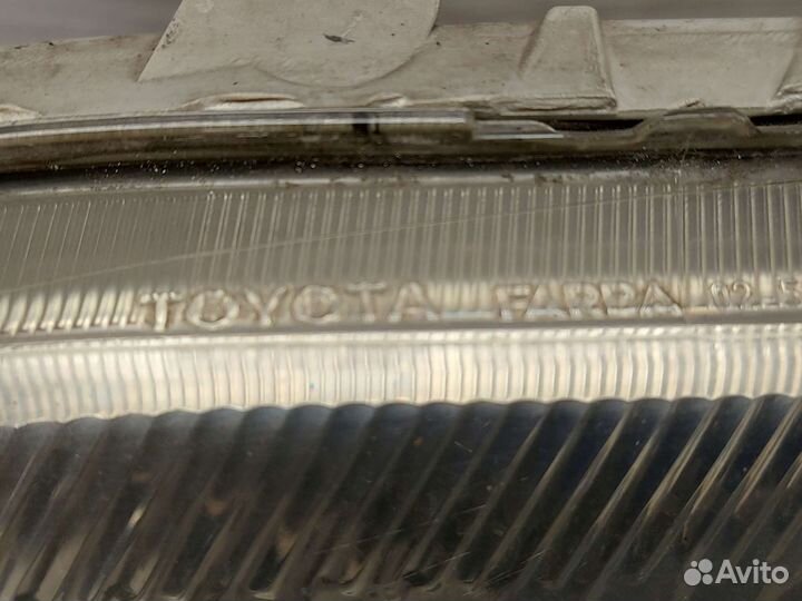 Фара левая Toyota Corolla 9. 2000-2004 Седан