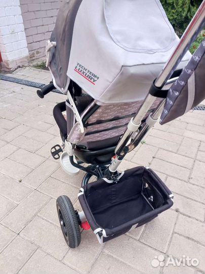 Трехколесный велосипед с ручкой