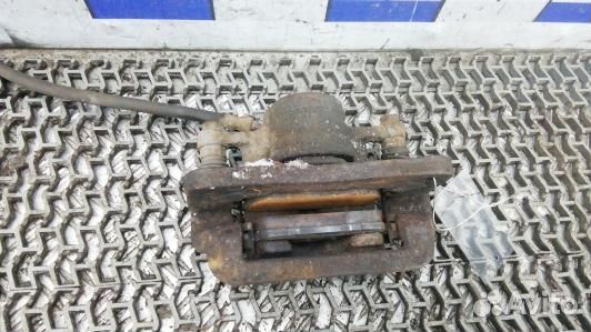 Суппорт тормозной задний левый KIA sorento 2 (CAD0