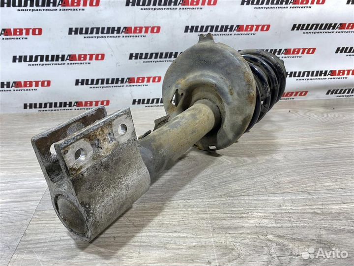 Амортизатор передний левый Пежо 308