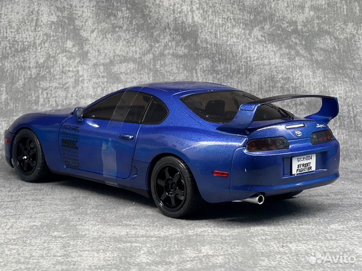 Модель toyota supra 80 1/18 solido