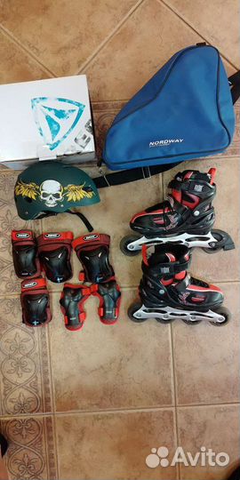 Роликовые коньки