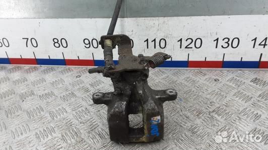 Суппорт тормозной задний левый toyota avensis T27