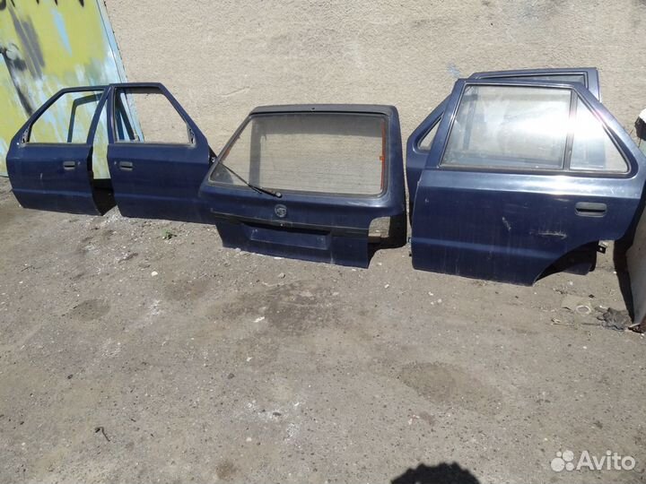 Шкода фелиция 1997 года двери