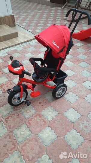 Трехколесный велосипед с ручкой