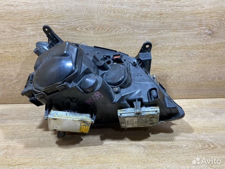 Фара левая Opel Vectra C дорест адаптивная 141059