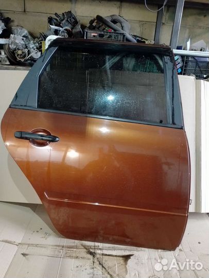 Дверь задняя правая калина