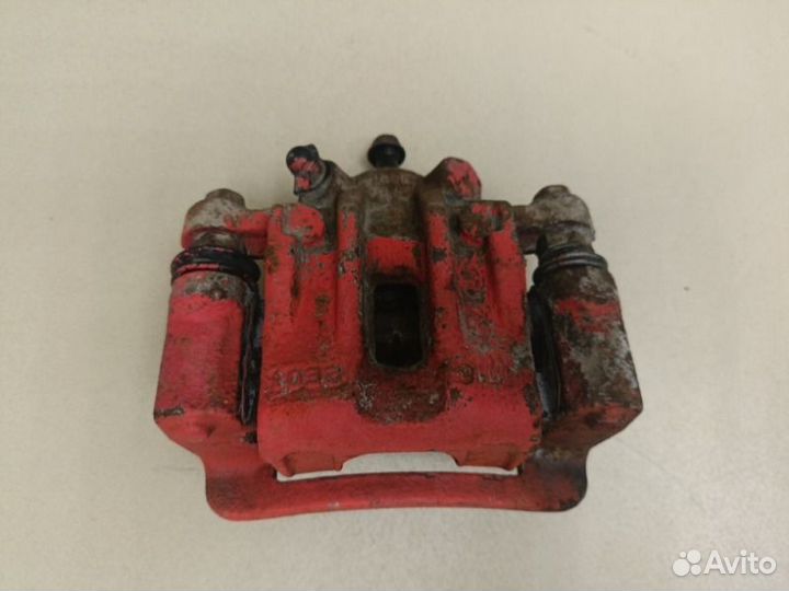 Суппорт тормозной задний левый Kia Cerato TD G4FC