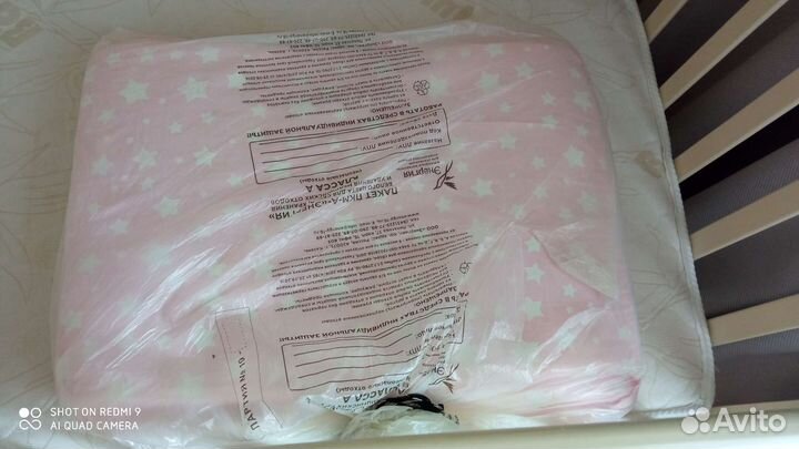 Детская кроватка с маятником