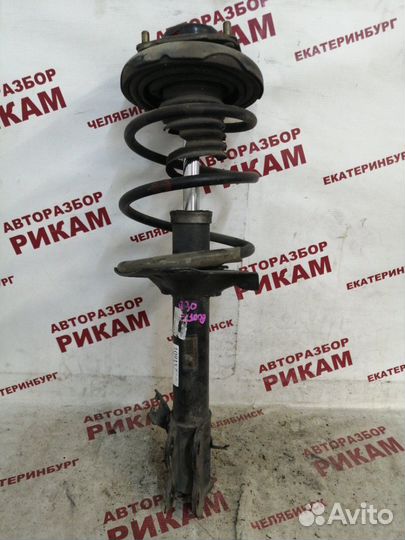 Стойка передняя левая Nissan X-Trail NT30 QR20DE