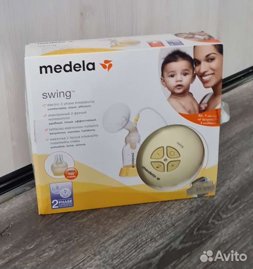 Молокоотсос medela swing электрический