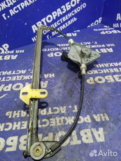 Задний левый стеклоподъёмник Skoda Octavia Tour