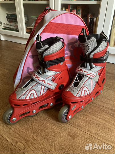 Роликовые коньки