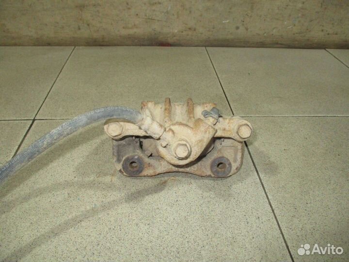 Суппорт задний левый Hyundai Elantra 4 (HD)