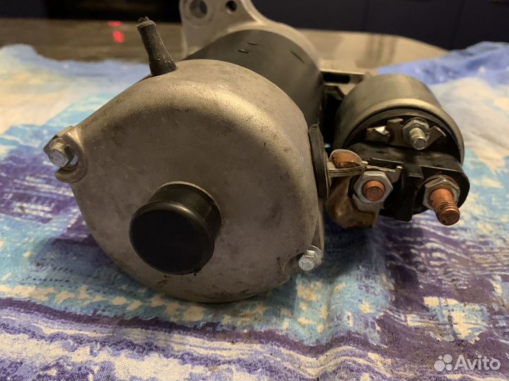 Стартер на audi q7 номер 057911023Е