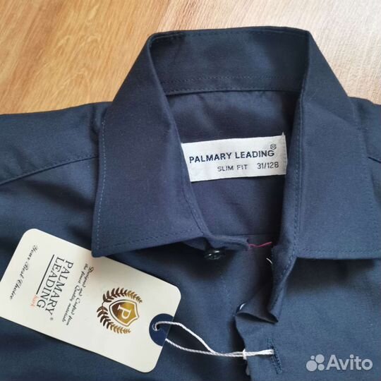 Рубашки на мальчика 128-134