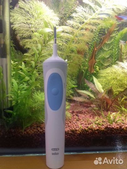 Электрическая зубная щетка