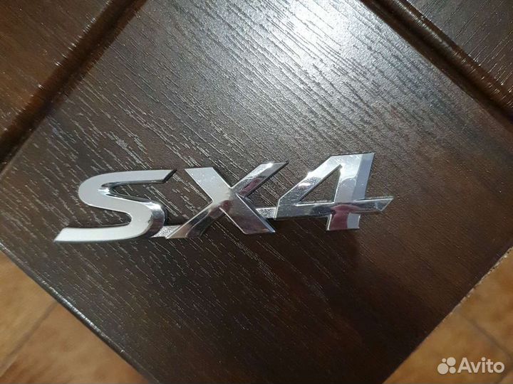 Логотип suzuki