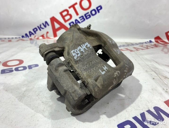 Суппорт тормозной передний левый Fiat Doblo