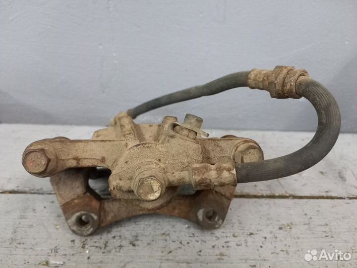 Суппорт задний левый Chevrolet Lacetti хэтчбек