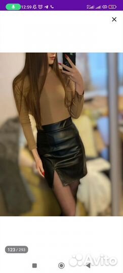 Мини юбка-карандаш кож.зам. с разрезом (новая)